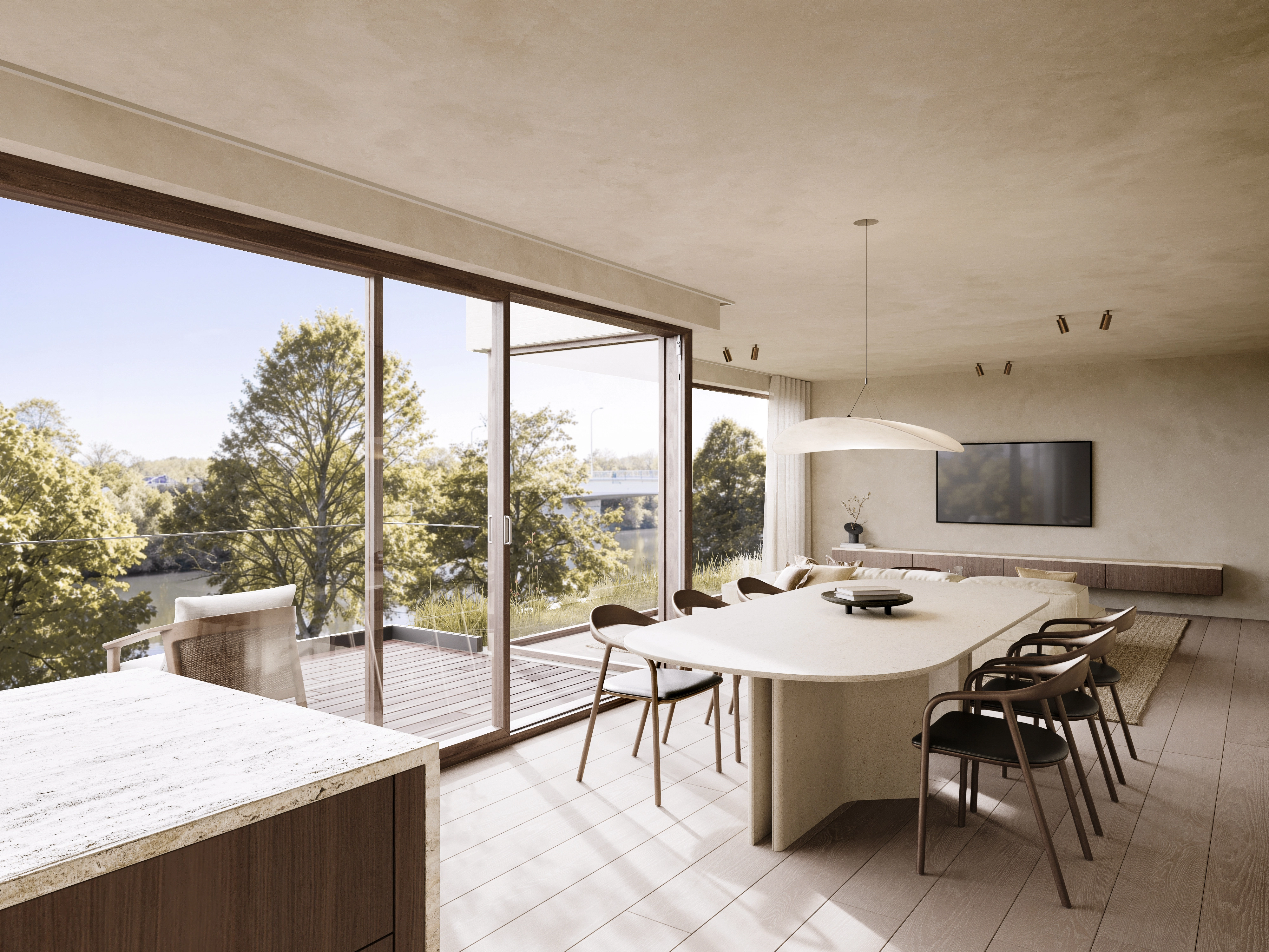 Eettafel en leefruimte met zicht op het water in woonproject Vaart